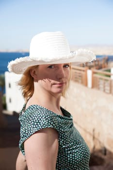 Woman with straw hat
