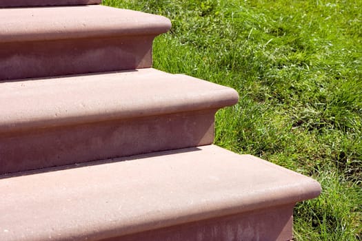 Photo of a ladder from a stone of conducting upwards