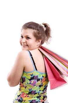On white background the young happy woman with packages for purchases