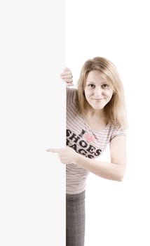 On white background the smiling young woman behind the white stand