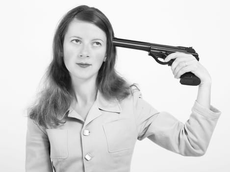 girl with a gun to his temple on a white background