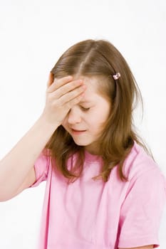 little girl holding a hand over the patient's head on a white background