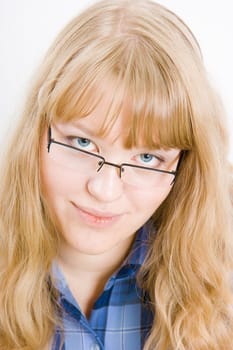 portrait of blonde with blue eyes with glasses