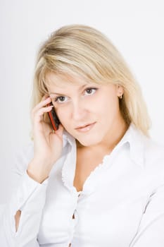 nice blonde girl talking on a cell phone