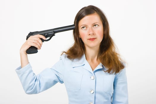 girl with a gun to his temple on a white background
