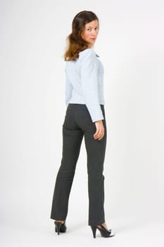 girl posing in a studio on a white background