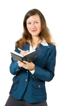 young girl holding a notebook and a smile on a white background