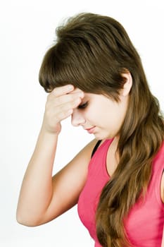 patient was a young woman holding his head on a white background