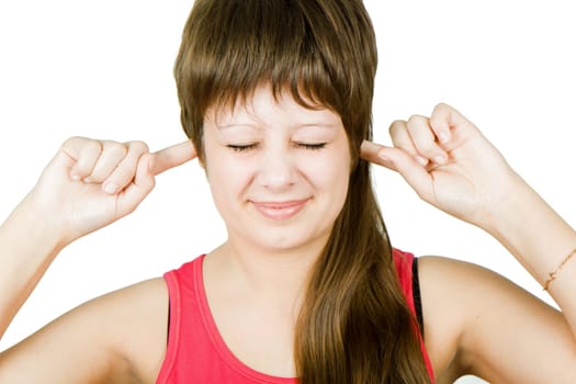 girl stopped up ears with his hands and closed her eyes