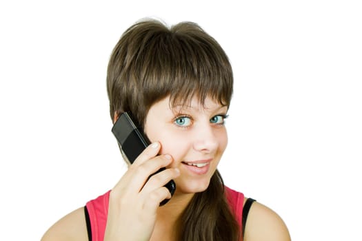 smiling beautiful girl with a phone on an isolated white background