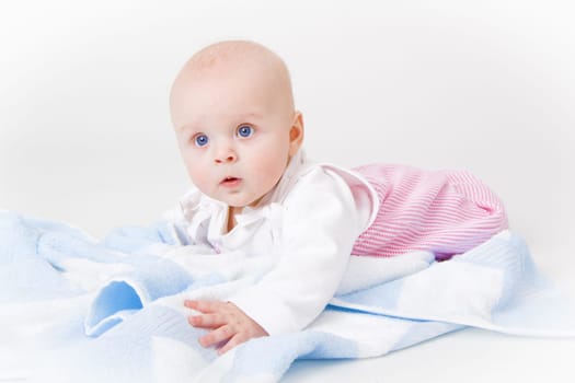 baby girl in the studio on the floor
