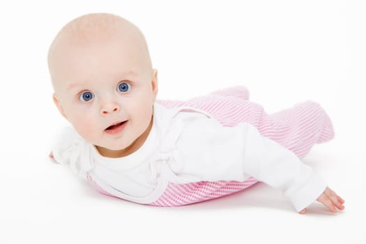 baby on a white background facing the camera
