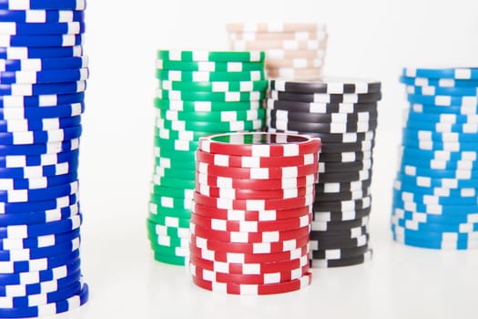 stack of poker chips on a white background