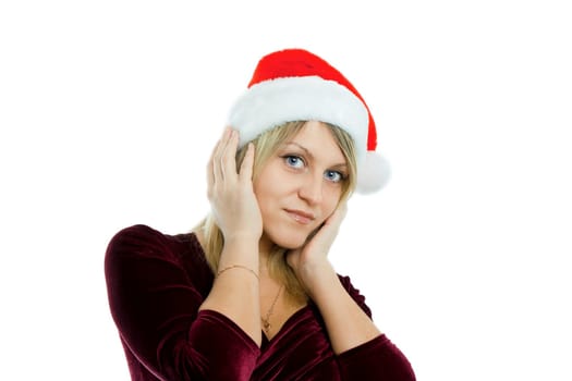 portrait of a beautiful blue-eyed blonde in a Christmas hat on the isolated background