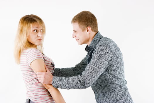 Man attacks woman on a white background