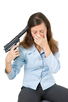 young woman aiming a gun at his head