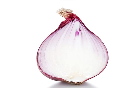Macro image of a halved red onion isolated against a white background