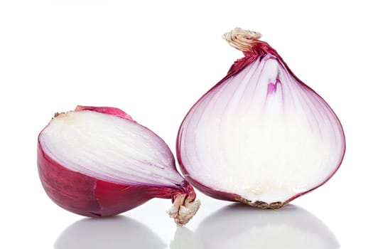 Two halves of a red onion insulated against a white background