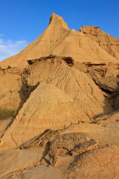 Desert landscape under the cloudy sky, Bardenas Reales, Navarra, Spain