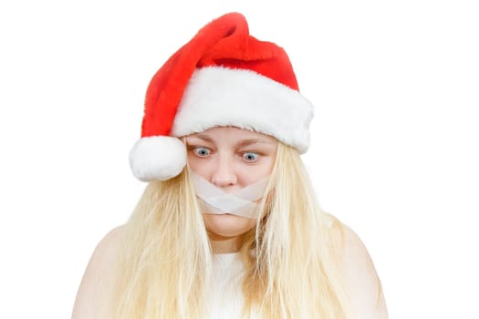 crazy girl in a Santa hat on a white background