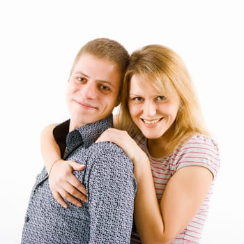 happy young couple. The girl hugs a guy. white background