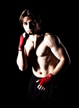 Young caucasian man preparing for hand-to-hand combat