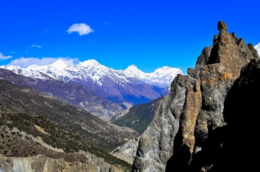 Himalayas mountains landscape view with rock in foreground, Nepal