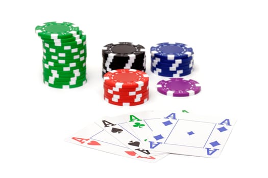 Set of poker chips and cards  on white