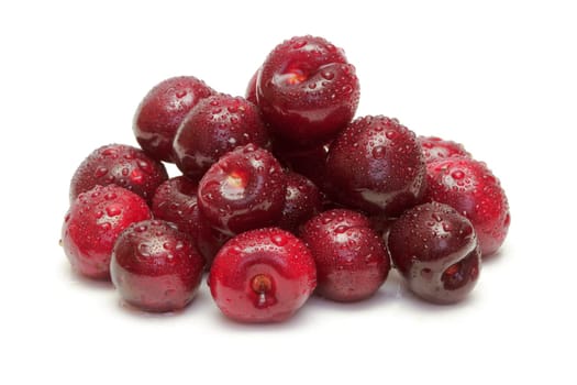 Ripe cherries on white background