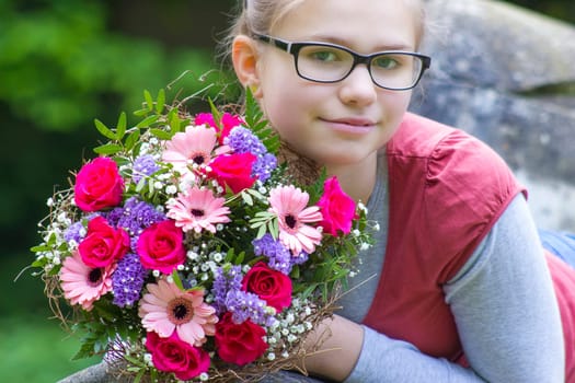 portrait of a beautiful young girl with flowers