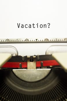 concepts of vacations from work, with message on typewriter.