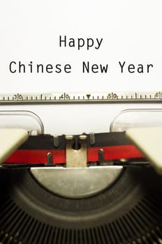 a close up of typewriter, focus on paper where message will be typed.