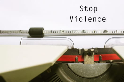 stop violence concept, with message on typewriter paper.
