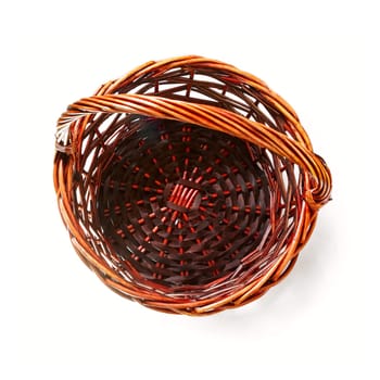 Handmade rattan basket on white background. Top view