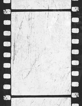 Grunge monochrome filmstrip with space for text . Vector