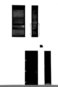 The photograph of a façade with symmetrically arranged windows and doors.