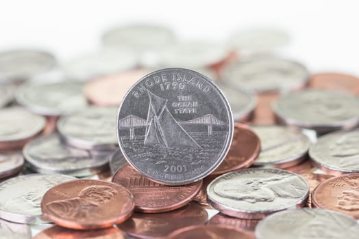 2001 Rhode Island State Quarter with other coins extreme close up