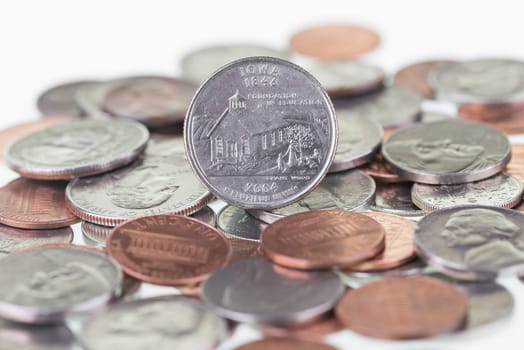 2004 Iowa State Quarter with other coins extreme close up