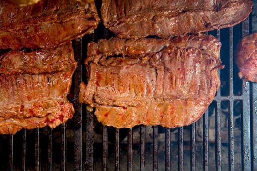 Beef meat barbecue grilled with embers and smoke american style