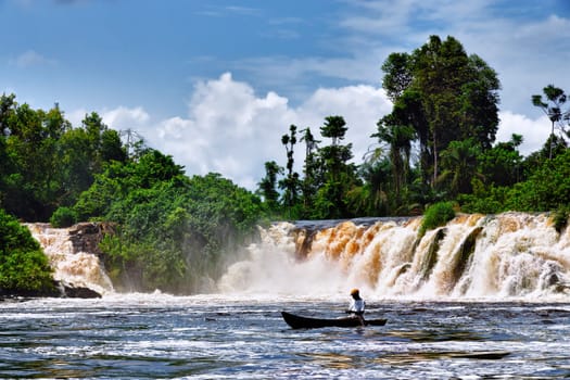 The old fisherman under the waterfall