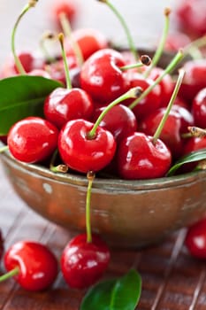 Vintage mug with fresh cherries