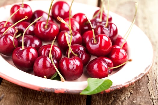 fresh cherries on a plate