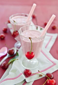 Milkshake with cherry flavor and fresh cherries