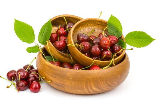 fresh cherries in a bowl on white background