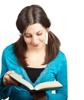 Young teenage girl reading from a book isolated over white background.
