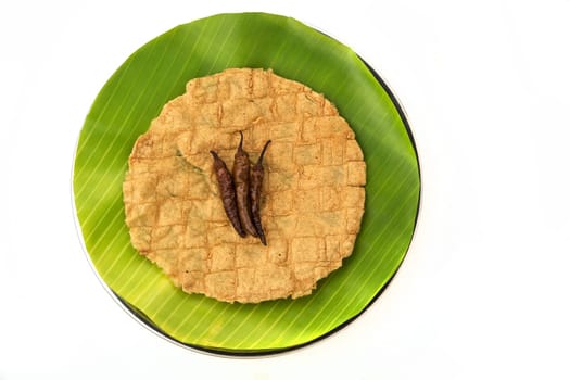 Fried indian chips isolated on a white background