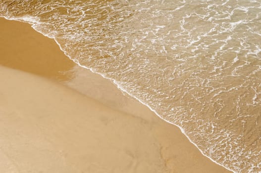 Sand beach and sea water