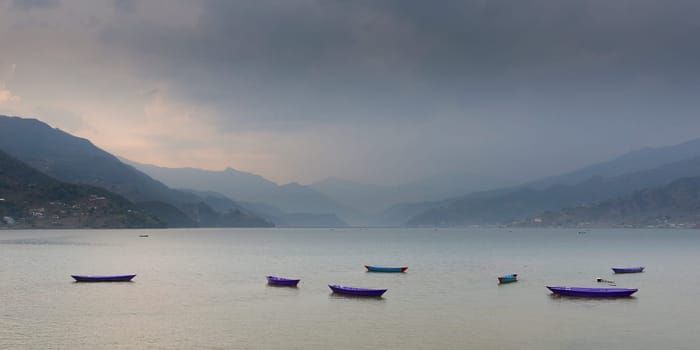 Boats on Phewa lake in Pokhara, Nepal