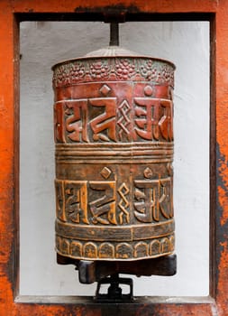 Prayer wheel at Bodhnath stupa in Kathmandu, Nepal