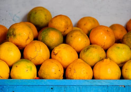 Organic oranges on a market stall
